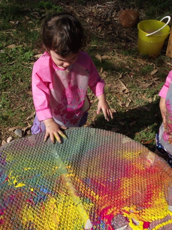 Encourage sensory and colour exploration through play with this easy activity for toddlers using simple recycled materials. A great idea for parents, childminders, early childhood educators, family day care and homeschool!