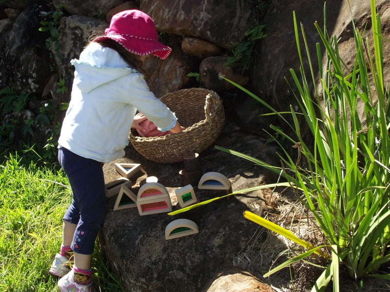 Simple toddler activity ideas to explore colour and texture through outdoor block play!