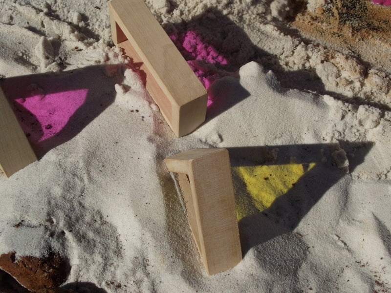 Simple toddler activity ideas to explore colour and texture through outdoor block play!