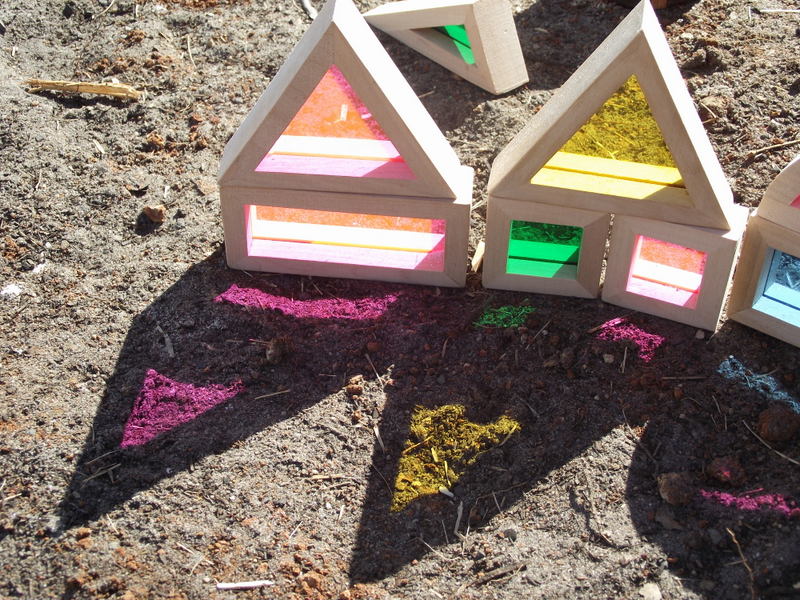 Simple toddler activity ideas to explore colour and texture through outdoor block play!