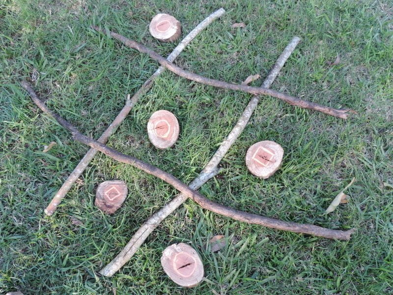 8 easy ideas to introduce play based learning activities into children's outdoor play using wooden cookies, nature and simple DIY resources. Fantastic ideas here for early childhood teachers, educators and homeschool!