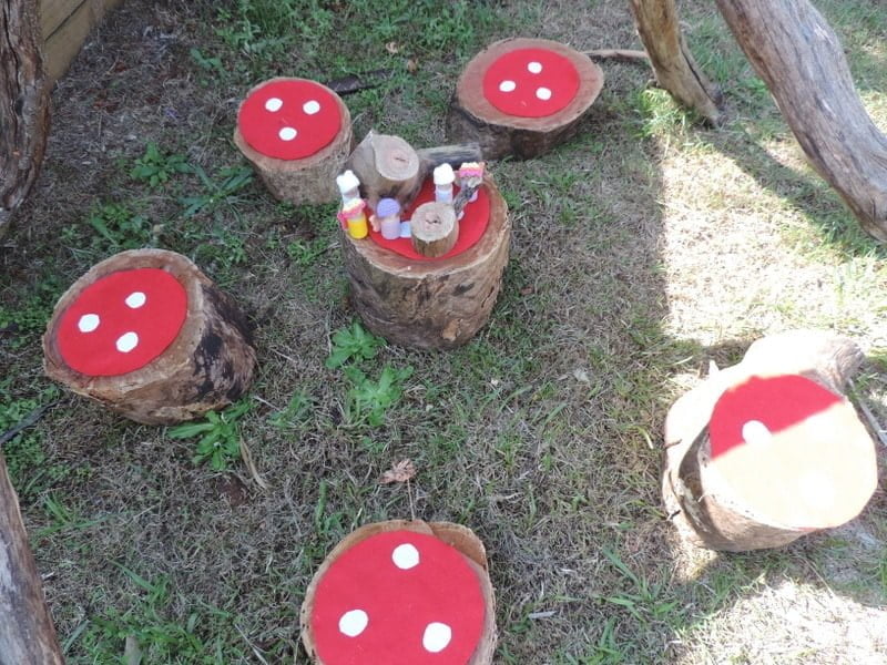 8 easy ideas to introduce play based learning activities into children's outdoor play using wooden cookies, nature and simple DIY resources. Fantastic ideas here for early childhood teachers, educators and homeschool!