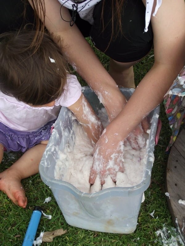 Follow this easy budget friendly recipe to make your own batch of soapy slime for sensory play. Safe for baby & toddler and a whole lot of messy fun!