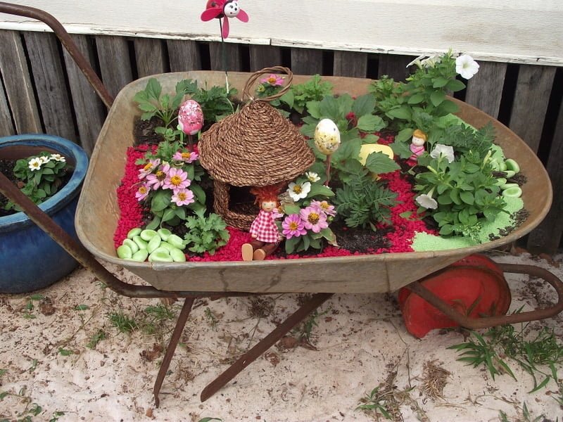 Create sensory small worlds and fairy gardens you can move all around the outdoor play space by upcycling old wheelbarrows. See how to make yours here!