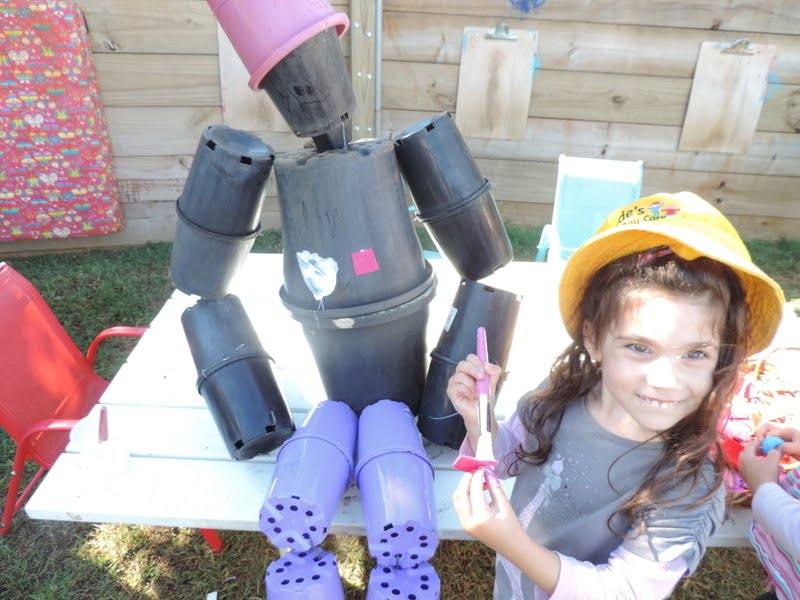 Don't throw out empty plant pots, turn them into a Pot Man Garden Scarecrow. A fun children's recycling project to try for families and early years educators -see how we made it!