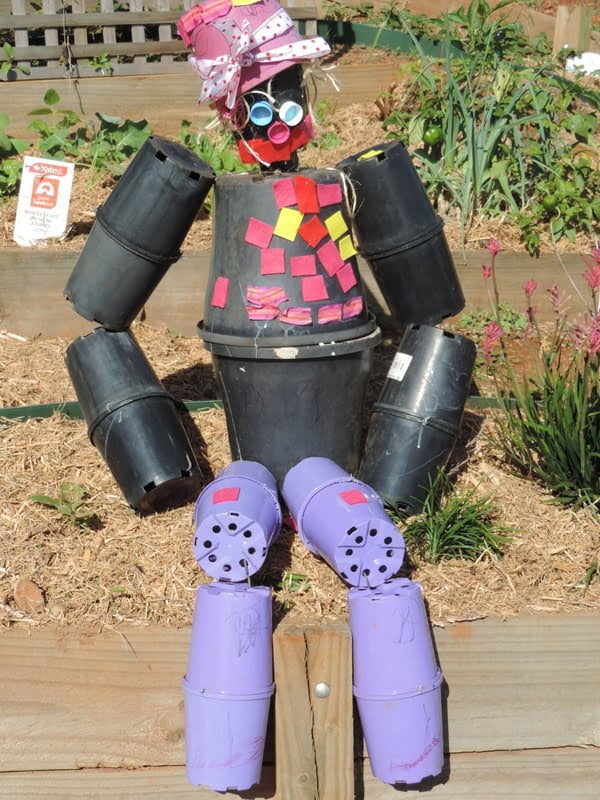Don't throw out empty plant pots, turn them into a Pot Man Garden Scarecrow. A fun children's recycling project to try for families and early years educators -see how we made it!
