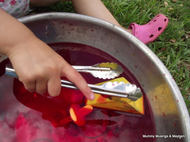 tongs and water