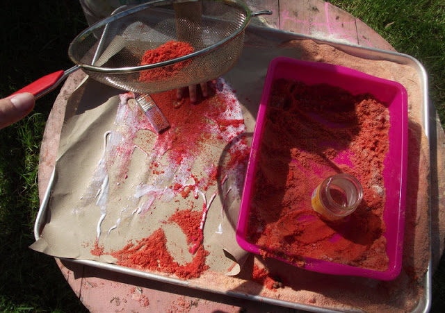 sifting sand and glue