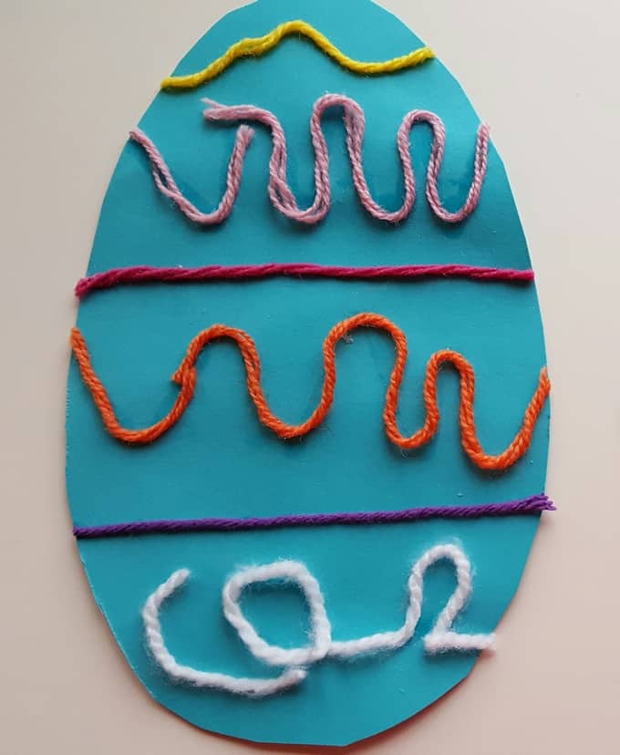 playful Easter activities for children -yarn decorated easter eggs 