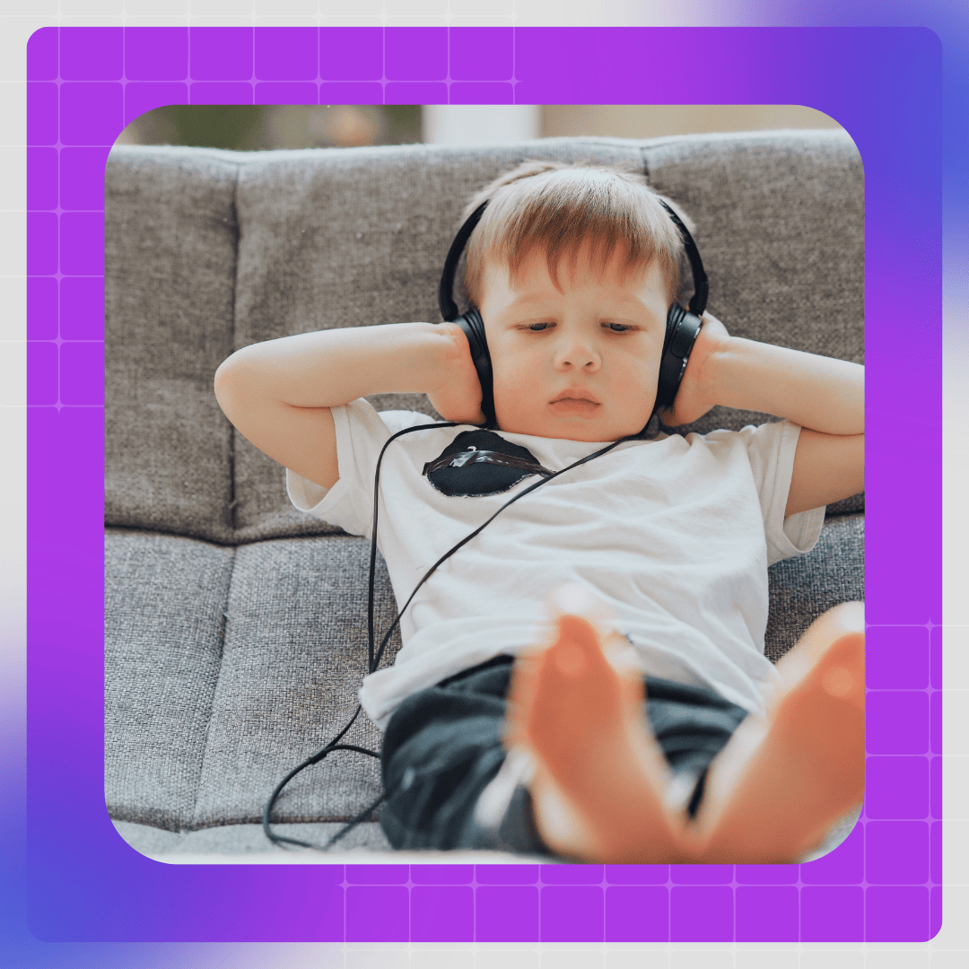 child with earphones doesn't like loud noises spd