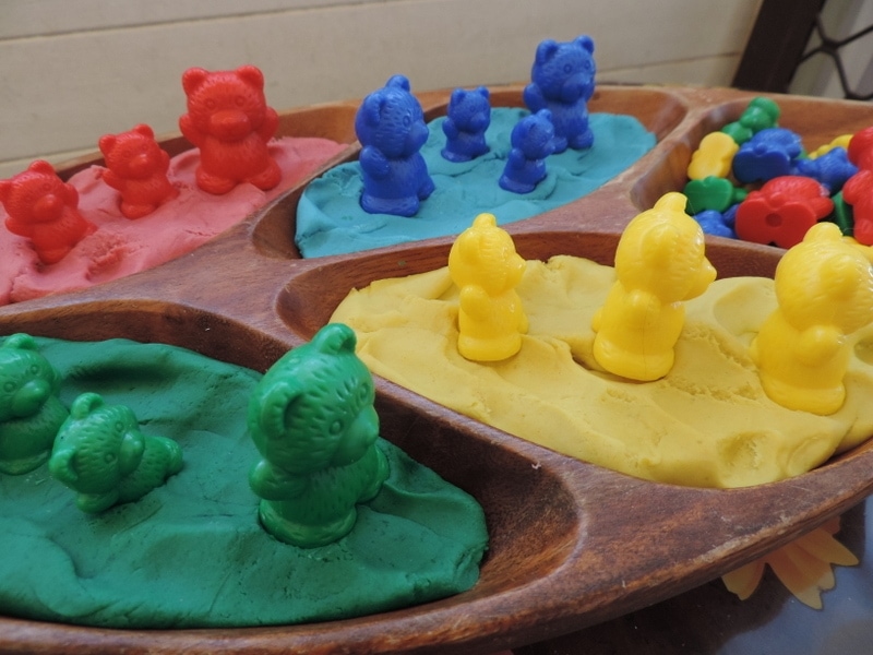 a sensory invitation to play for preschool children with playdough and bears